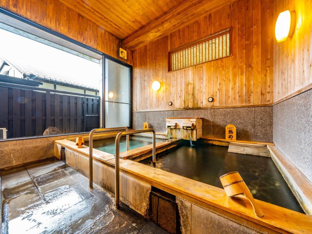 Отель Yawaragi-No-Sato Yadoya Юфу Экстерьер фото