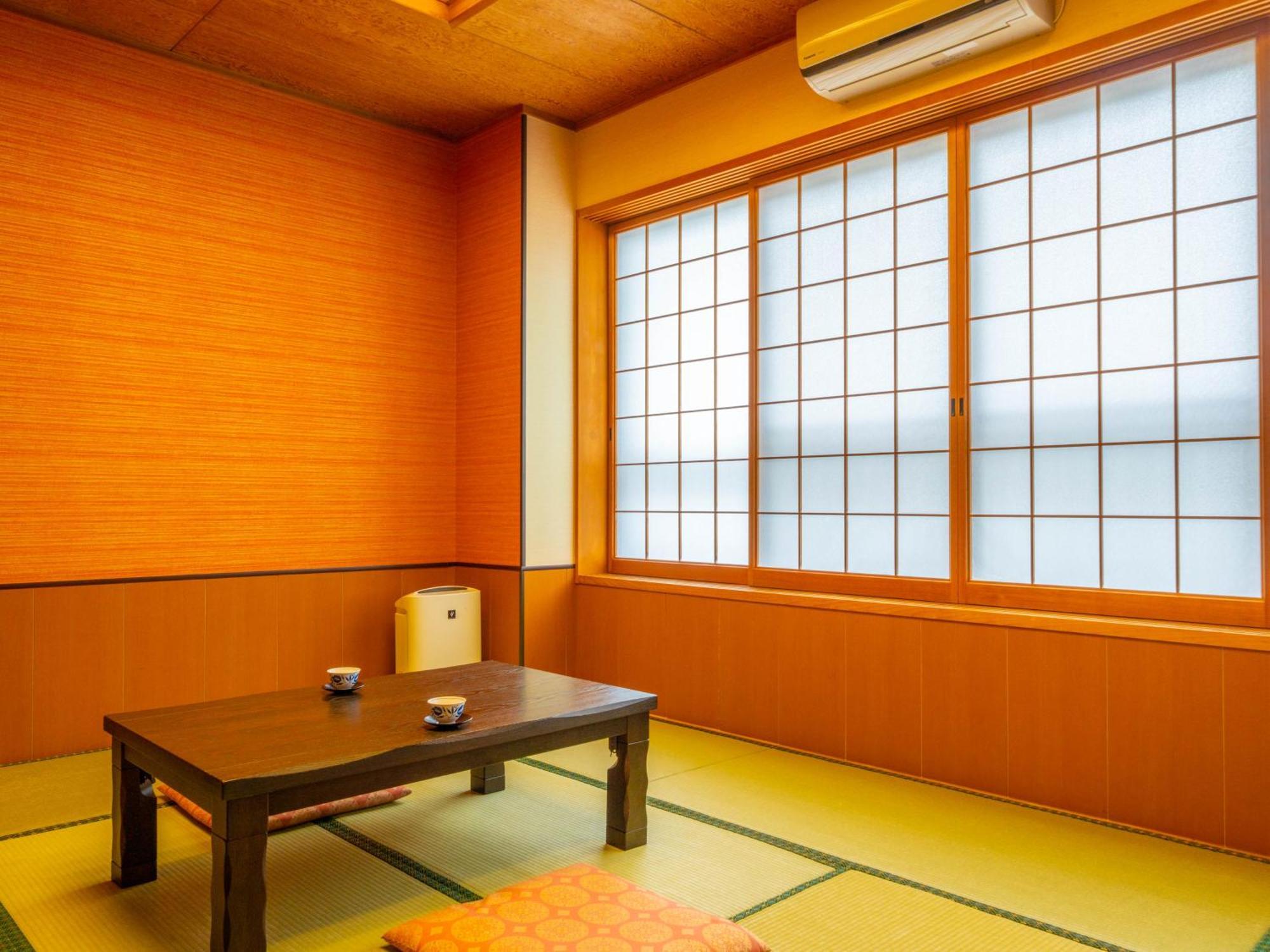 Отель Yawaragi-No-Sato Yadoya Юфу Экстерьер фото